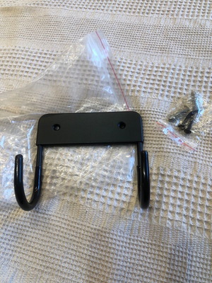 Metal wall hanger black with screws for ironing board and other uses