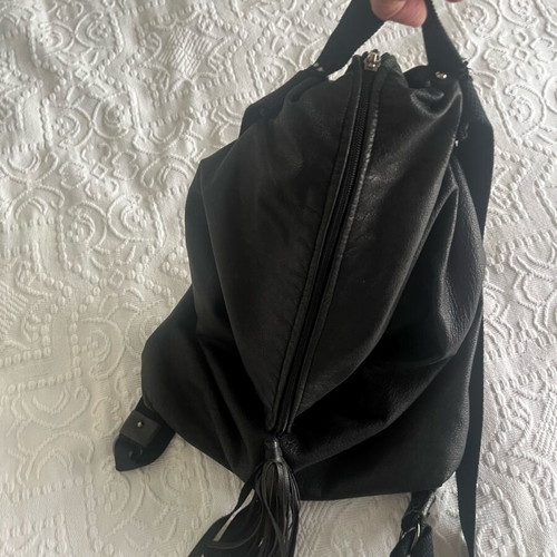 Leather backpack used with inner lining and fabric straps