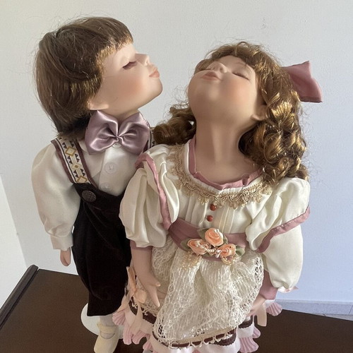 Cute porcelain doll couple boy and girl in box, vintage