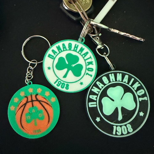 Panathinaikos keychain set like new, glow in the dark and double-sided