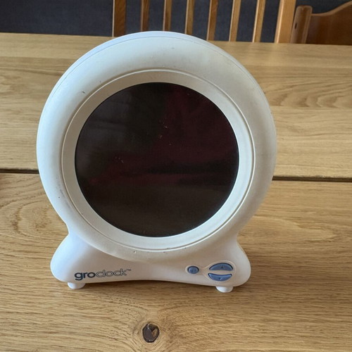 GroClock sleep training clock used, with storybook
