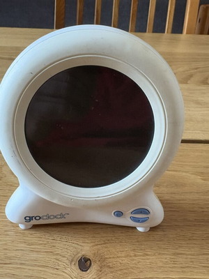 GroClock sleep training clock used, with storybook