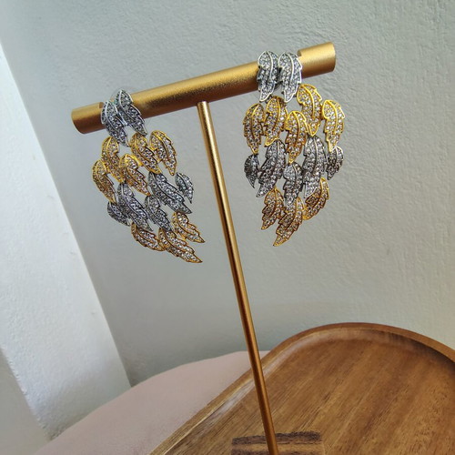 Earrings in gold and silver with zircon, like new