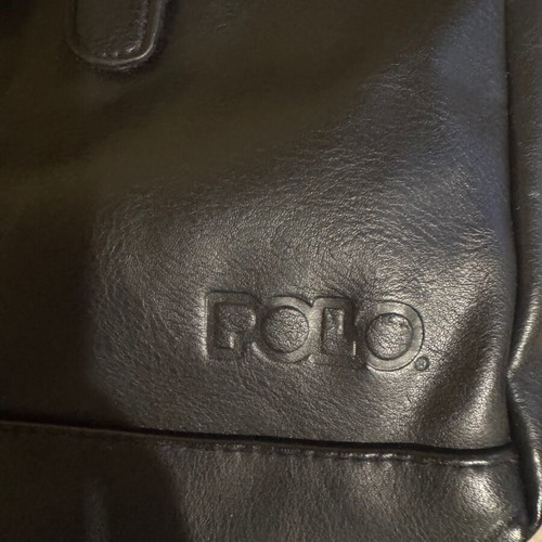 Polo backpack black used with a tear