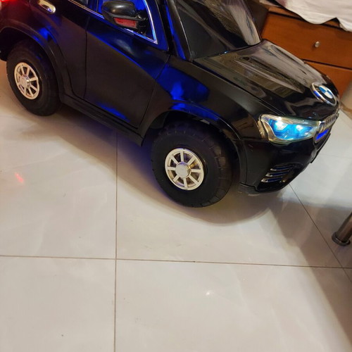 BMW X6 electric ride-on car like new with remote control and LED lights