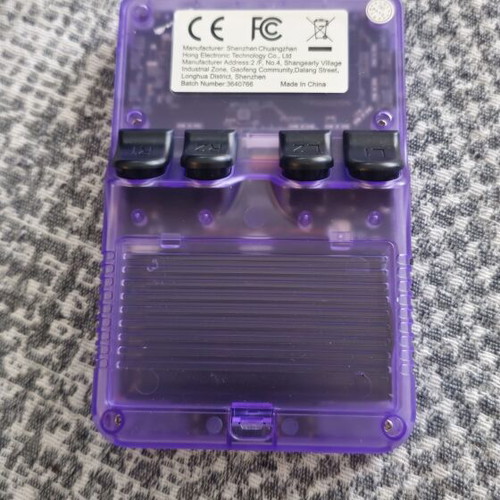 R36S handheld console like new with thousands of games