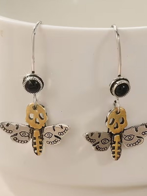 Gothic style earrings new with skull and wings design