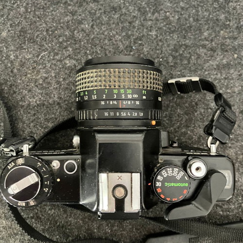 Praktica B200 analog camera used, with lens