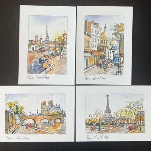 Paris collectible postcard set like new, 4 pieces with Eiffel Tower and Notre-Dame