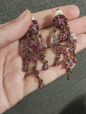 Vintage clip-on chandelier earrings with fuchsia rhinestones and bronze details