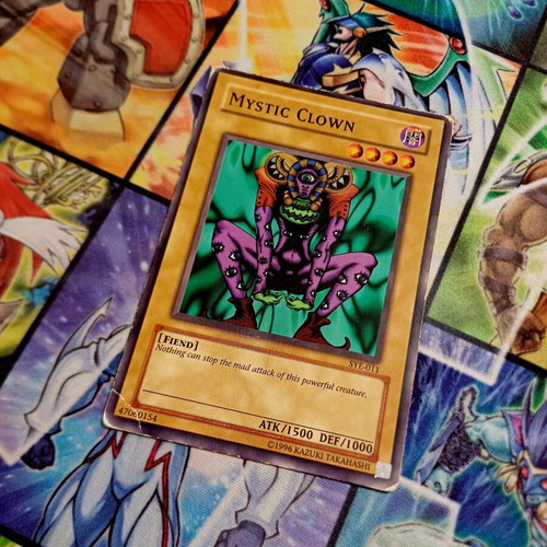 Mystic Clown SYE Unlimited Yu-Gi-Oh! card, poor condition (PO)
