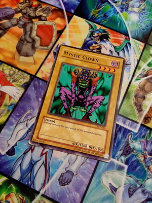Mystic Clown SYE Unlimited Yu-Gi-Oh! card, poor condition (PO)