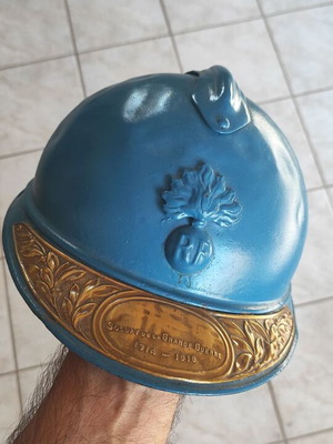 French World War I Adrian helmet used with commemorative plaque