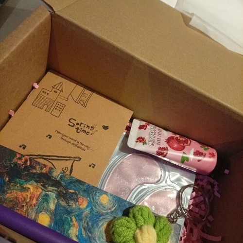 Gift set with skincare and stationery products, new