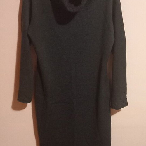 Long knitted gray dress used with loose neckline and decorative holes