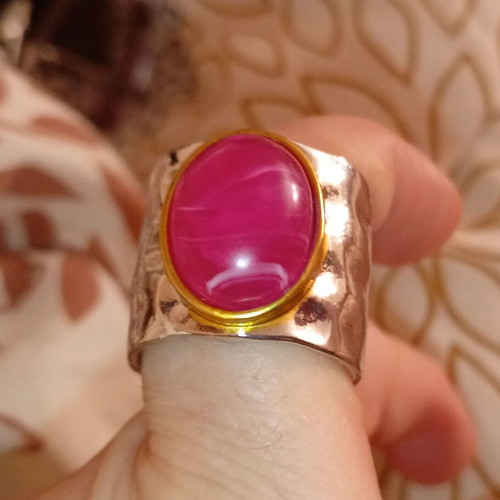 Enigma ring with pink oval stone and hammered copper metal