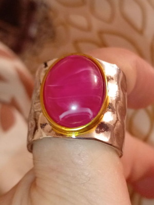 Enigma ring with pink oval stone and hammered copper metal