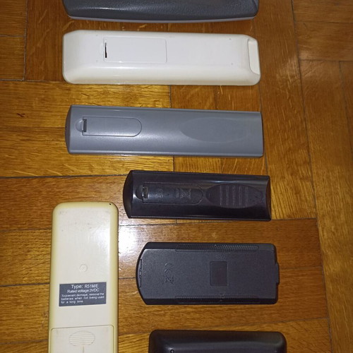 Set of 7 different TV remote controls