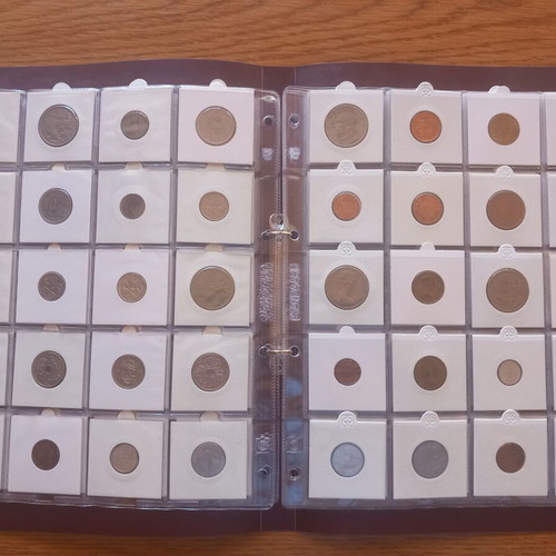 World coin lot used, 100 different coins in soft album