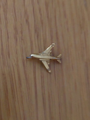Airplane pin used, not gold
