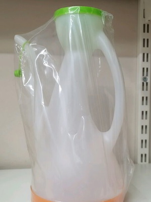 Plastic oil container 1.3 liters new with lid and plate