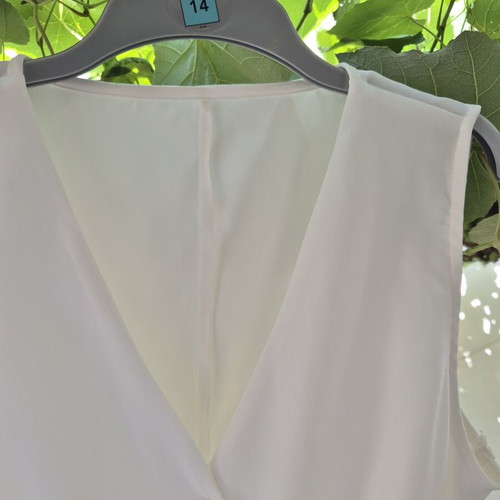 Vest cream like new, soft flowing fabric, size XL