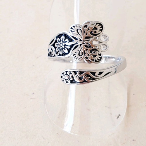 Silver 925 ring carved with butterfly design, like new, adjustable