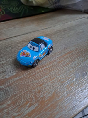Метална кола Diecast Pixar Cars Dinoco Tia мащаб 1:55