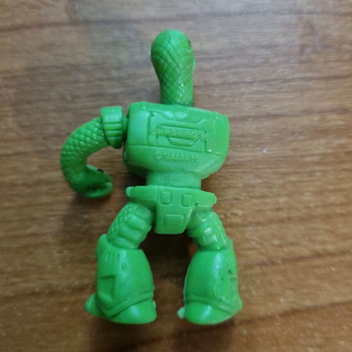 Teratomachos figure green cobra snake used, missing one arm