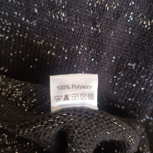 Women's black glitter sweater used, size L