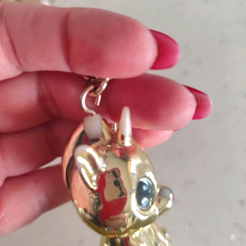 Keychain gold used with wear on the head