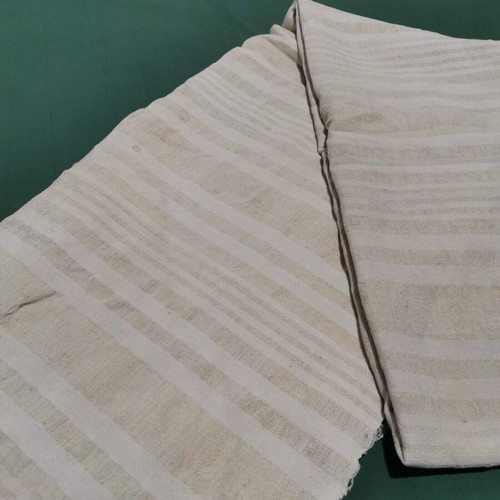 Woven wool bed sheet used with wear from 1930 era