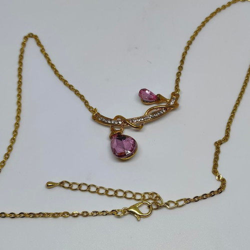 Pendant with pink crystals and gold chain like new