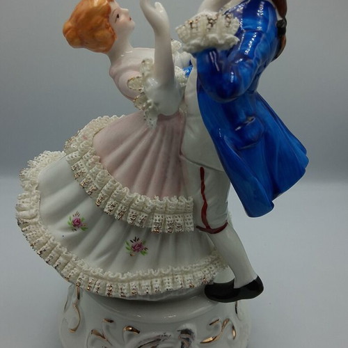 Vintage porcelain music figurine of dancing couple, like new