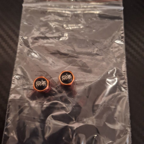 Oz Racing Garage valve caps used, red with orange pearl, set of 2