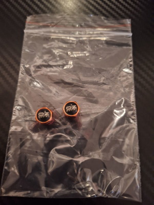 Oz Racing Garage valve caps used, red with orange pearl, set of 2
