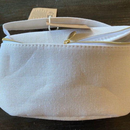 White toiletry bag new with iridescent golden threads