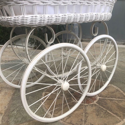 Doll pram used with white wicker basket