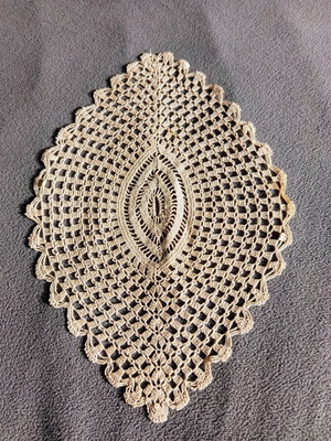 Handmade oval crochet doily used, vintage