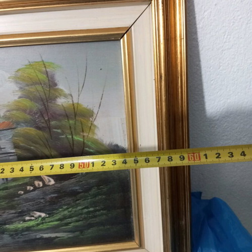 Oil painting used on wood with landscape theme and frame