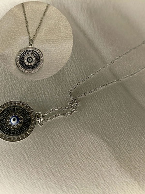 Steel necklace with mataki pendant new, silver color
