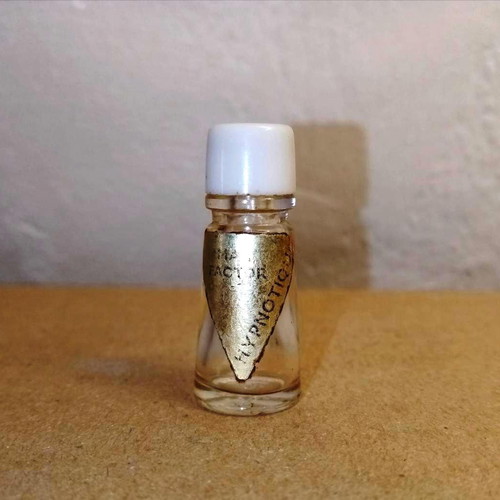 Hypnotique miniature bottle by Max Factor used, collectible