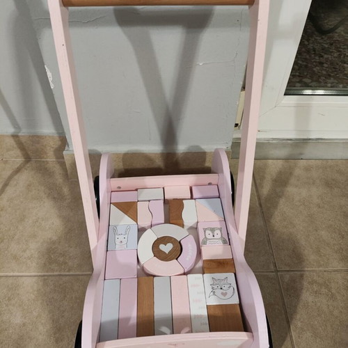 Wooden baby walker with 31 puzzle pieces