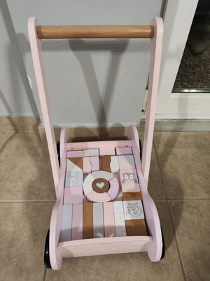 Wooden baby walker with 31 puzzle pieces