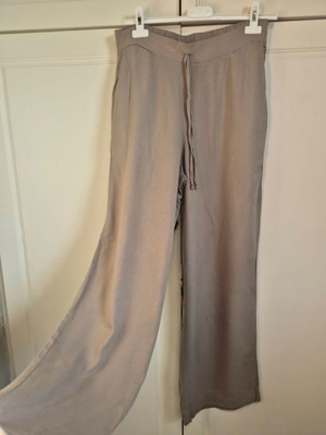 Regalinas beige pants one size like new, viscose