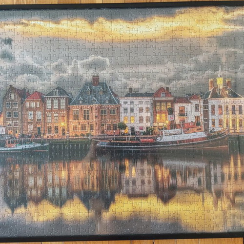Framed puzzle like new, dimensions 0.53x0.73 m