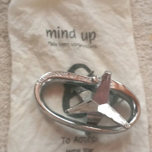 Metal adult puzzle like new with pouch