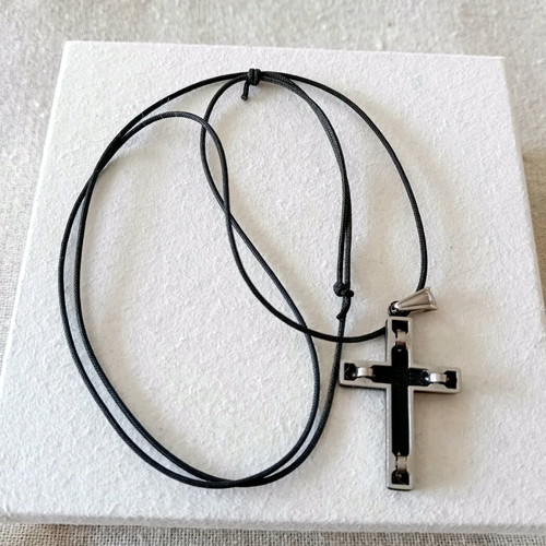 Double-sided cross with black adjustable cord like new, stainless steel
