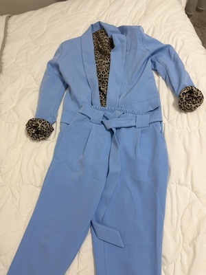 Baby Blue Suit one size with leopard lining like new