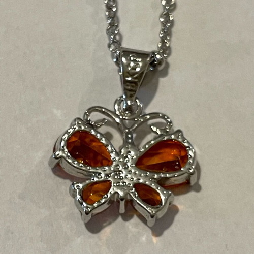Necklace with orange butterfly pendant like new